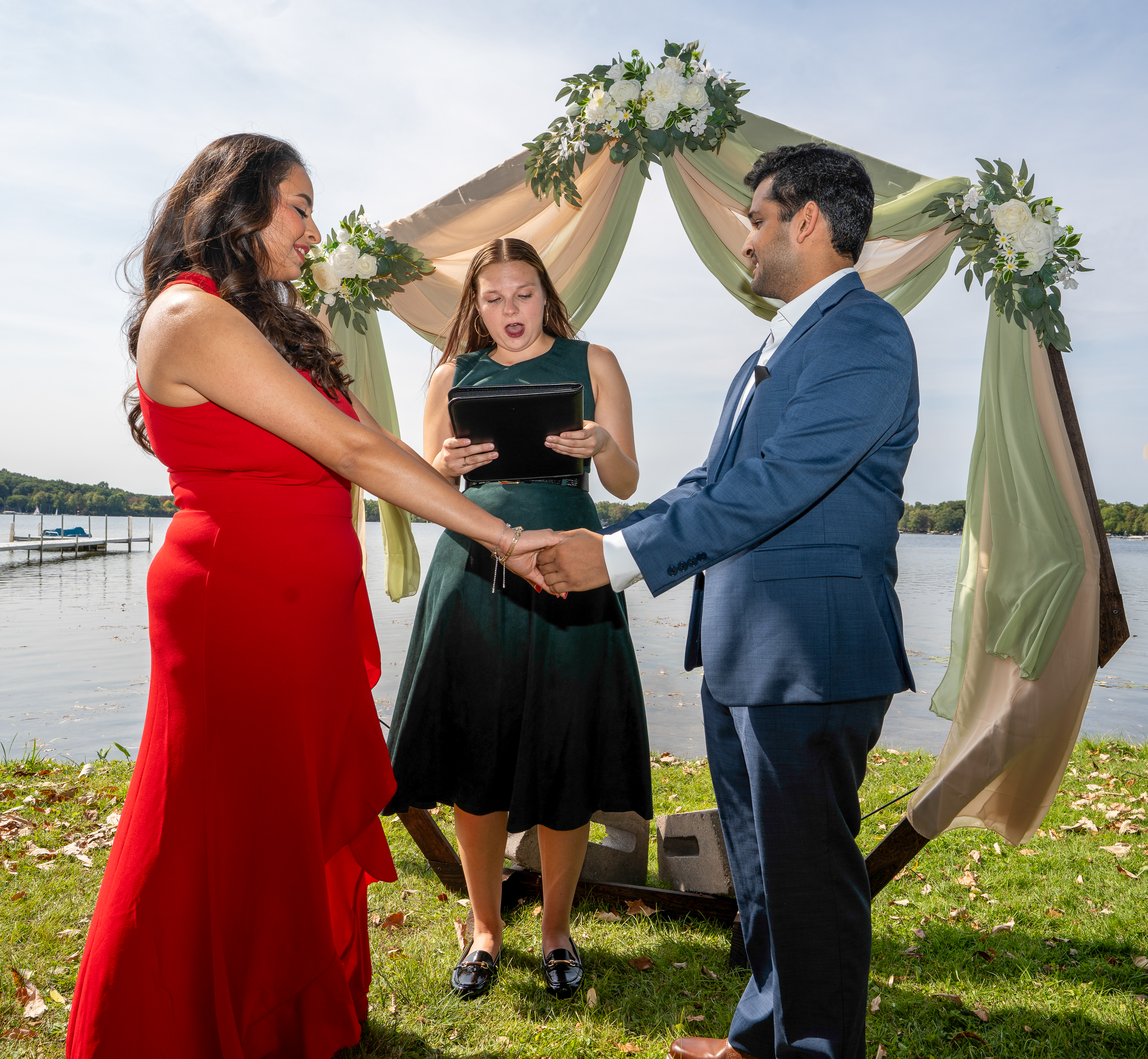 Elegant couple portrait with Detroit skyline backdrop
